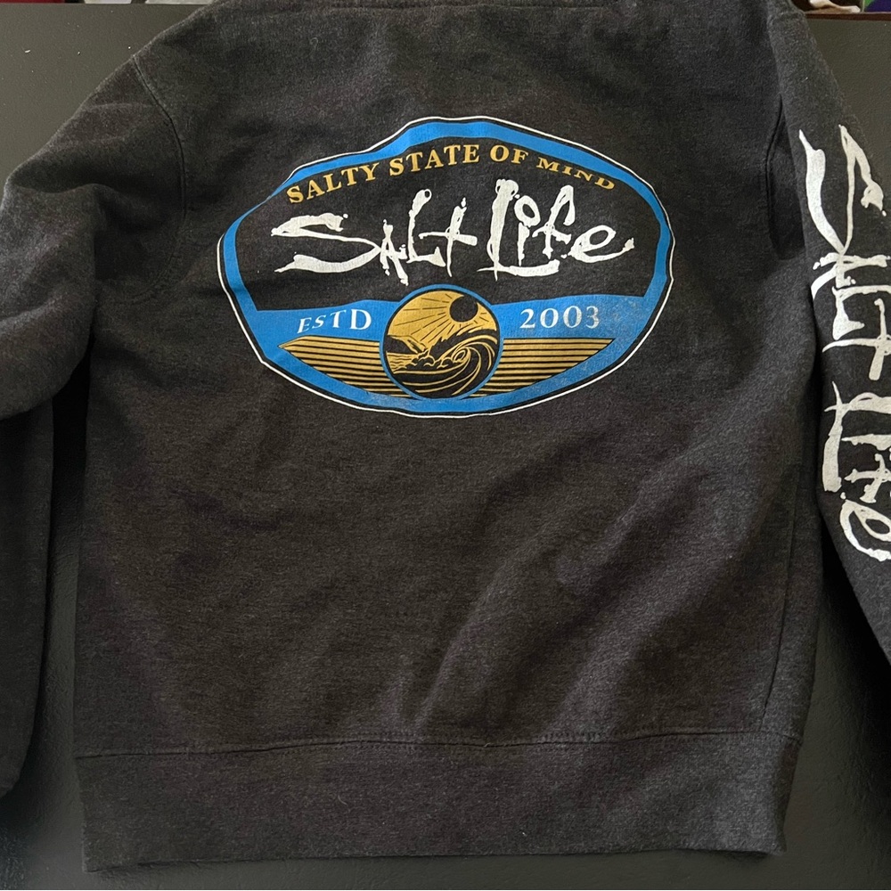 Saltlife sweater for kids. Size medium. Fits 7-10 year old